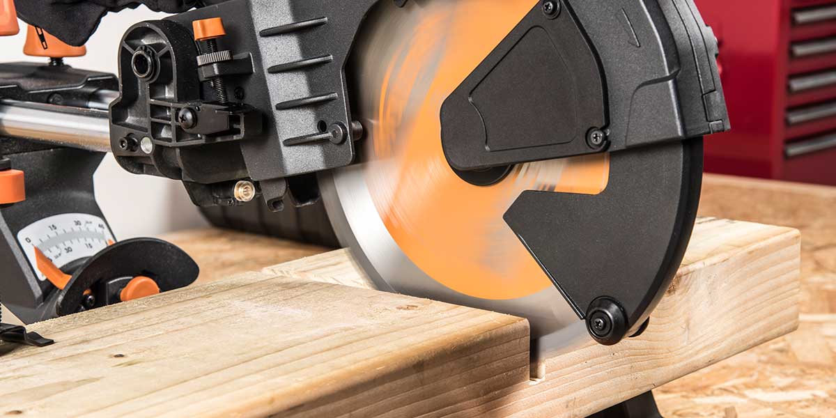 Evolution mitre saw with adjustable depth stop cutting a trench in wood